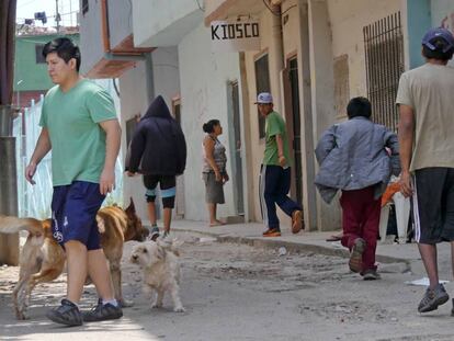 Young people on the streets of Villa 1-11-14 in Buenos Aires.