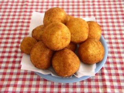 Ración de 'arancini', símbolo de la comida siciliana.