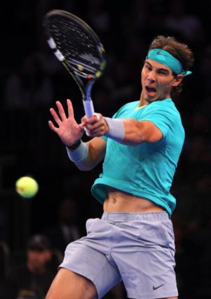 Rafael Nadal returns a shot to Juan del Potro during their exhibition match on Monday.