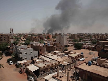 Smoke rises from a central neighborhood of Khartoum, Sudan, Sunday, April 16, 2023, after dozens have been killed in two days of intense fighting.