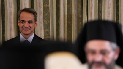 El primer ministro griego, Kyriakos Mitsotakis, preside la jura del cargo de su nuevo Gobierno, este martes en el palacio presidencial de Atenas.