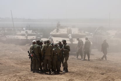 Israeli soldiers gather near the southern border of the Gaza Strip on May 9.