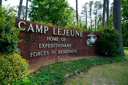 Signage stands on the main gate to Camp Lejeune Marine Base outside Jacksonville, N.C., April 29, 2022