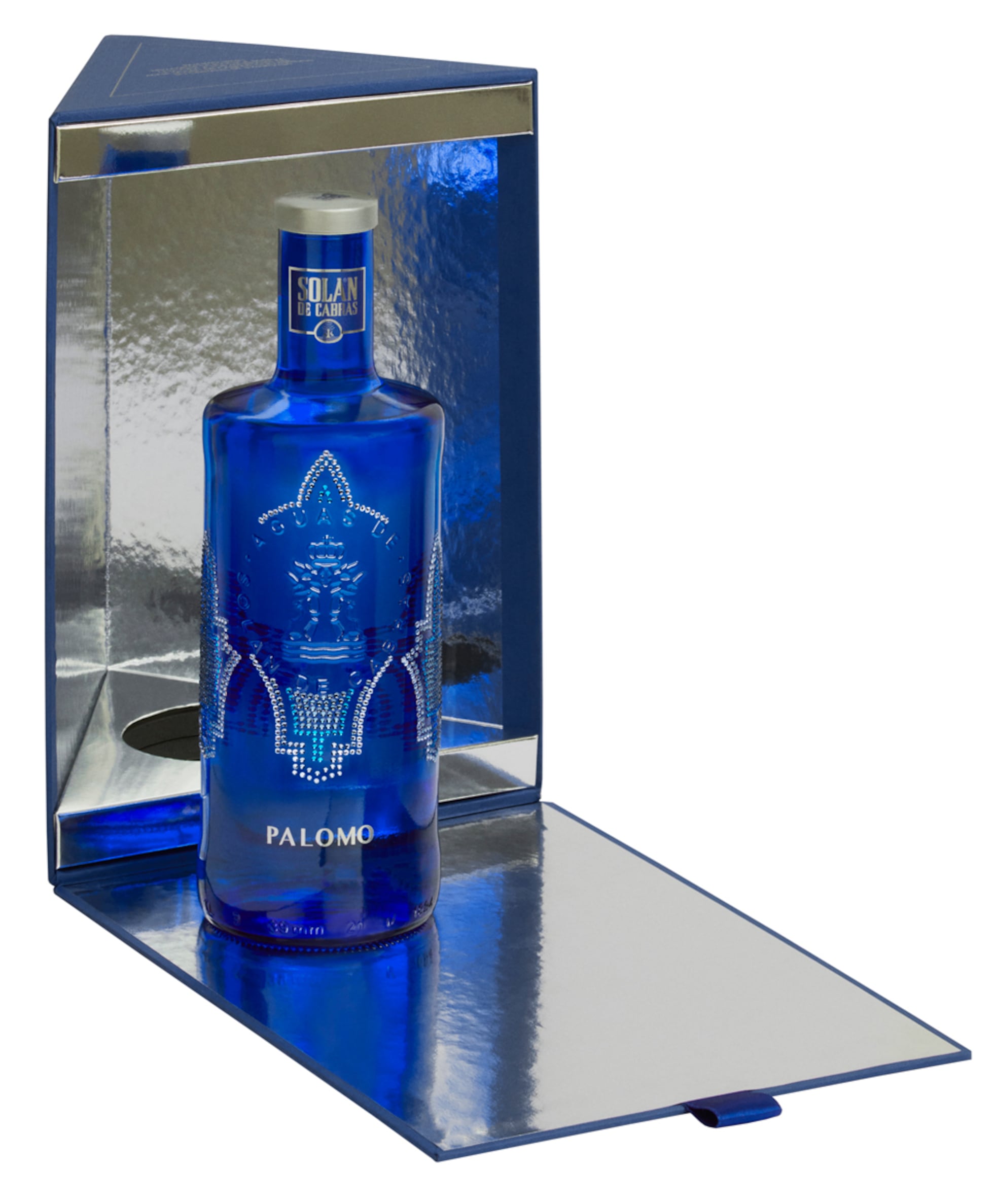 Con diseño de Palomo Spain y cristales de Swarovski: la botella que vestirá  tu mesa esta Navidad es de agua mineral | ICON | EL PAÍS