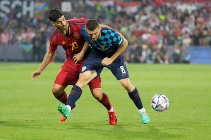 Marco Asensio y Kovacic en una jugada.