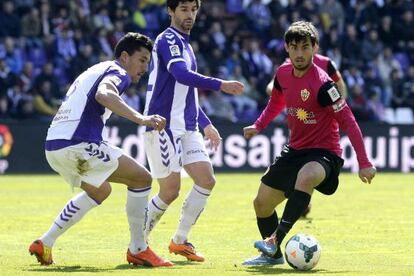 Suso, entre Rueda y Víctor.