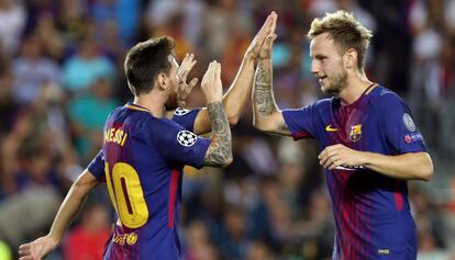 Messi celebra con Rakitic el tercer gol del Barcelona ante el Juventus.