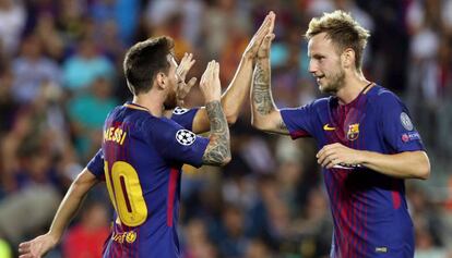 Messi celebra con Rakitic el tercer gol del Barcelona ante el Juventus. 