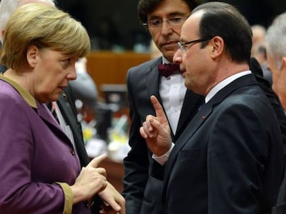 Merkel y Hollande, este jueves en Bruselas.