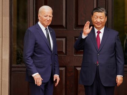 Chinese President Xi Jinping waves as he meets with U.S. President Joe Biden in Woodside, California, on November 15, 2023.