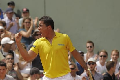 Nicolas Almagro celebra un punto ante Marcos Baghdatis 