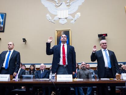 The three witnesses at Wednesday's congressional hearing on UFOs are sworn in: from left, Ryan Graves, David Grusch and David Fravor.