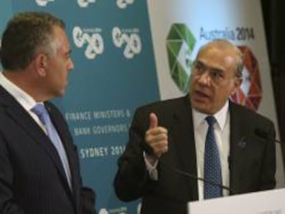 El secretario general de la OCDE, Angel Gurría, y el tesorero federal de Australia, Joe Hockey, ofrecen una rueda de prensa conjunta en la reunión de ministros del G20 en Sídney (Australia) hoy, viernes 21 de febrero de 2014.