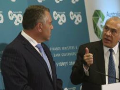 El secretario general de la OCDE, Angel Gurría, y el tesorero federal de Australia, Joe Hockey, ofrecen una rueda de prensa conjunta en la reunión de ministros del G20 en Sídney (Australia) hoy, viernes 21 de febrero de 2014.