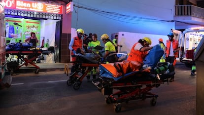 Emergency services evacuate those injured in the collapse.