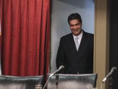 El Jefe de Gabinete argentino, Jorge Capitanich, asiste a una rueda de prensa en el Ministerio de Economía en Buenos Aires (Argentina).
