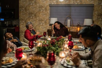 Family talking in the dining table on christmas at home