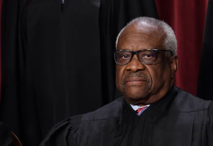 Justice Clarence Thomas poses for the official Supreme Court portrait in October in Washington.