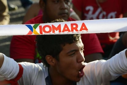 A supporter of Libre candidate Xiomara Castro, protests in Tegucigalpa the day after Sunday's general elections.