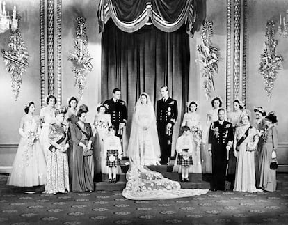 Members of the British Royal family and guests pose around Princess Elizabeth and Philip, Duke of Edinburgh; at right the group includes Britain's King George VI with Princess Alice of Athlone