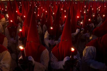 Members of the ‘Real Hermandad del Santísimo Cristo de las Injurias’ (Royal brotherhood of the Blessed Christ of the wounds) make a vow of silence during the processions through the streets of Zamora, the night of Holy Wednesday.