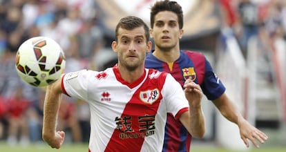 Baptistao y Bartra, en un lance del Rayo-Barcelona.