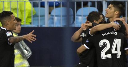 El Sevilla celebra el gol de Correa. 