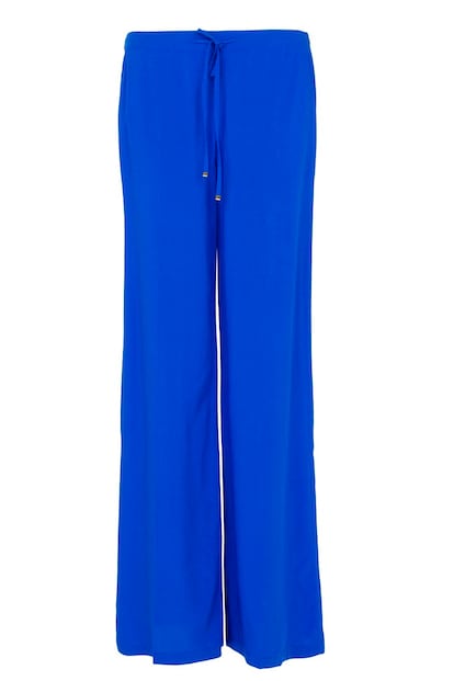 Pantalón palazzo en azul eléctrico, de Mango (19,99 euros).