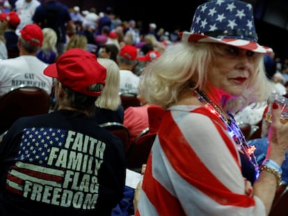 Republican supporters display American flag-themed outfits.