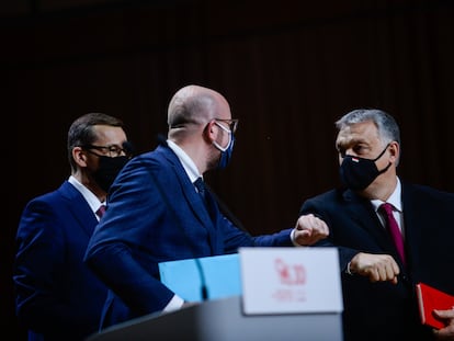 European Council President Charles Michel (l) greeting Hungarian PM Viktor Orban in February.