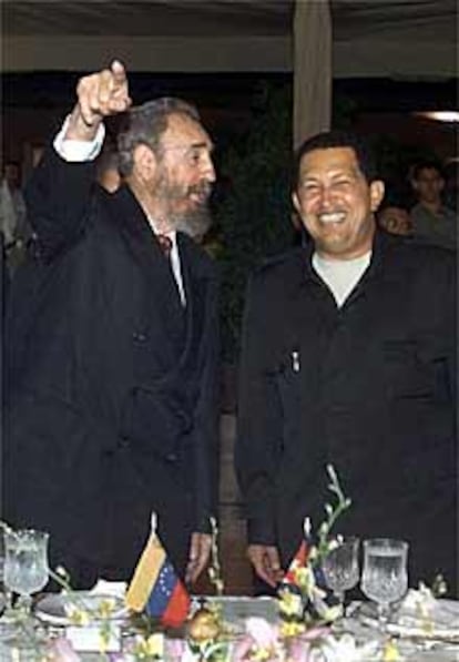 Fidel Castro y Hugo Chávez, en Puerto Ordaz, Venezuela, el pasado 12 de agosto.