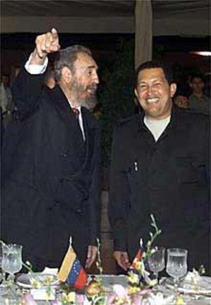 Fidel Castro y Hugo Chávez, en Puerto Ordaz, Venezuela, el pasado 12 de agosto.