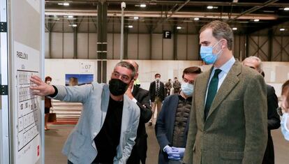 King Felipe visits the field hospital in Madrid’s IFEMA convention center.