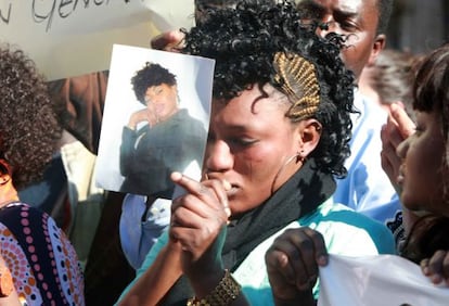 A woman attends a memorial to murdered Bilbao prostitute Mauren Ada Ortuya.