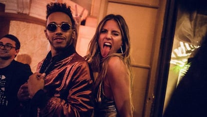 La modelo Heidi Klum y el piloto de Fórmula 1 Lewis Hamilton en la fiesta de 'Harper's Baazar' el pasado 8 de septiembre.