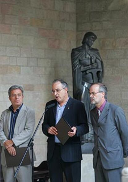 Saura, Bargalló y Castells, tras la reunión.
