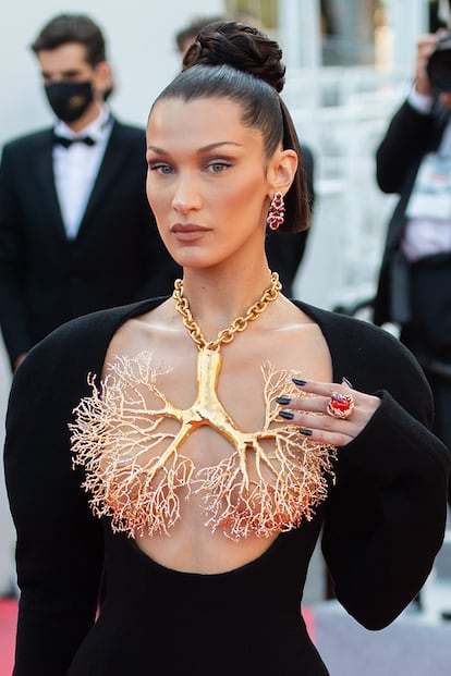 Model Bella Hadid stole the show two years ago at the Cannes Film Festival in a low-cut black dress and huge gold Schiaparelli necklace.
