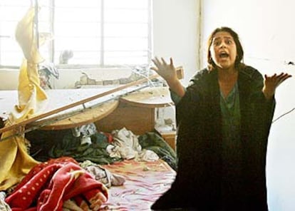 Una mujer iraquí grita en el escenario del atentado.