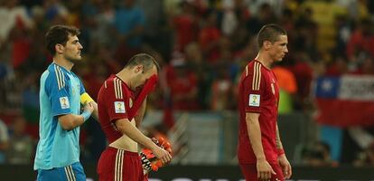 Casillas, Iniesta y Torres, tras la eliminación.