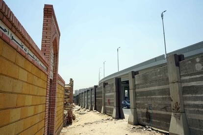 One of the boundaries of the Imam al-Shafi cemetery in Cairo, showing a road widened in recent years that runs right in front of it. 