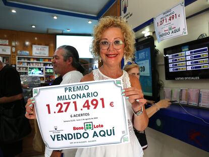 Mari Ángeles Torregrosa, the owner of the shop who sold the winning ticket.