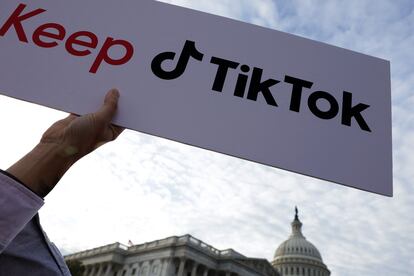 A supporter holds up a sign that read "Keep TikTok" during a news conference on TikTok in front of the U.S. Capitol on March 22, 2023, in Washington.