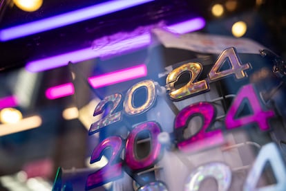 2024 glasses are displayed ahead of New Year's Eve in Times Square, Friday, Dec. 29, 2023, in New York.