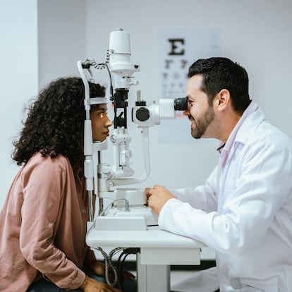 Young woman doing optical exam at medical clinic