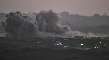 A column of smoke rises from the Gaza Strip following an Israeli attack on Thursday.
