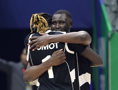 South Sudan's Kuany Ngor Kuany and Nuni Omot celebrate after the match on Aug. 28, 2023.