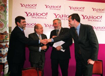 Francesc Antich, Jordi Pujol y Marc Forné, con el consejero delegado de Yahoo! Ibérica, Javier Etxebeste.