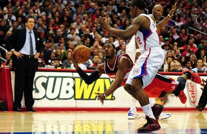 John Wall cae ante Lamar Odom.