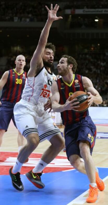 Marcelinho y Llull en un Madrid-Barça.