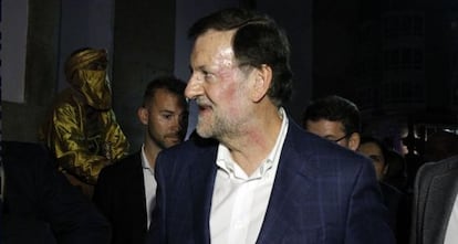 Rajoy, con la cara magullada tras el puñetazo que ha recibido.